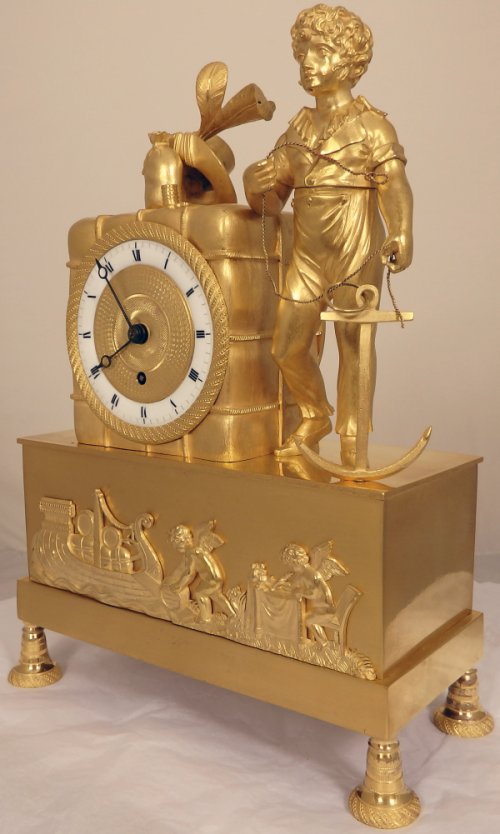 A small English Antique Regency nautical themed mantel clock Ian